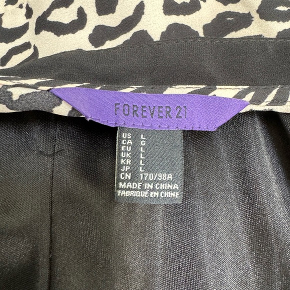 Casual dress black and animal print with said zipper for everyday use. - Picture 9 of 11